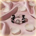 Pearl Floral Rhinestone Beaded Bracelet on elegant blush silk background with rose petals