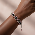 Black Rose Garden Bracelet worn on a plus size Black woman's wrist – Breast Cancer Awareness Collection by Be Glitzy Glam