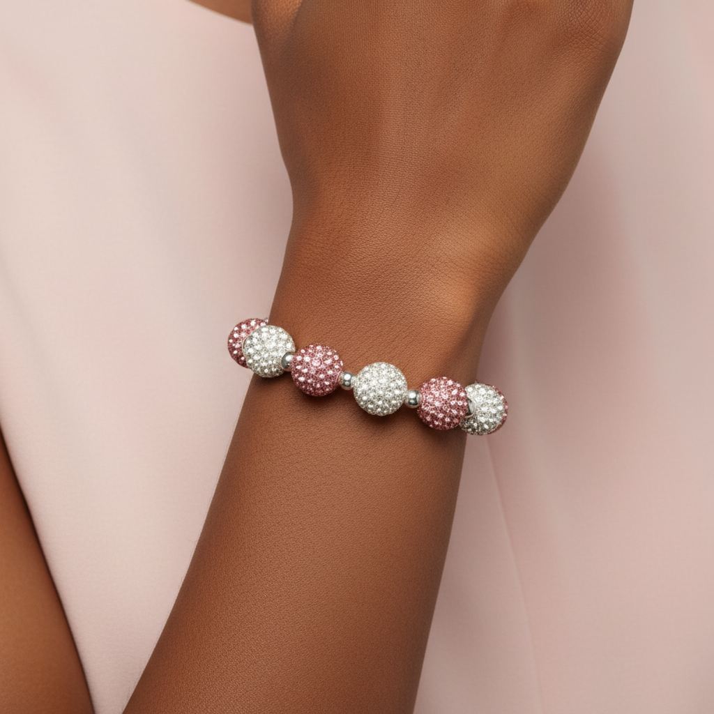Pink & White Crystal Pavé Sparkle Bracelet worn on a Black woman's wrist – Breast Cancer Awareness Collection by Be Glitzy Glam